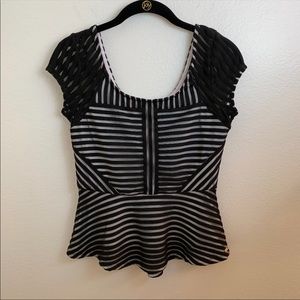 NWT Bebe Sheer Black Peplum Top. Sz XS